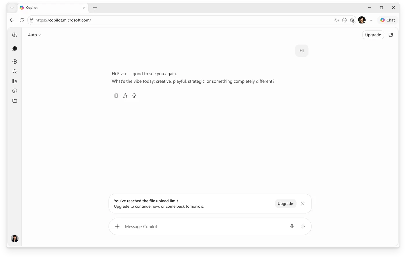 Copilot on the web showing a calm inline notice: 'You've reached the file upload limit. Upgrade to continue now, or come back tomorrow,' with an Upgrade button.